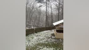 Snowfall accumulates northwest of Atlanta