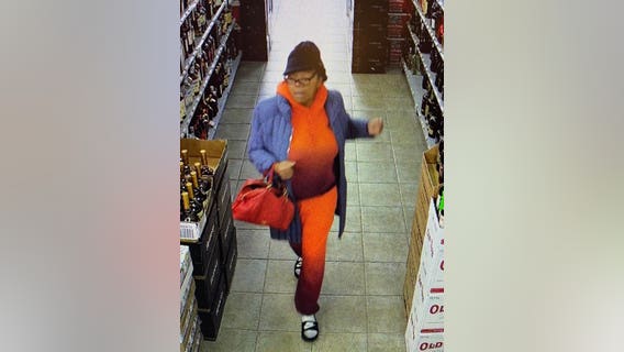 Woman caught on camera shoplifting from liquor store, police say