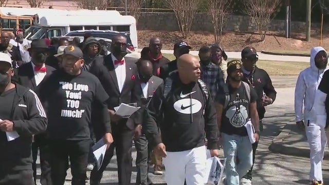 Volunteers go door to door in an effort to combat teen crime