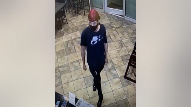Masked man wanted for armed robbery at Douglas County pizza place