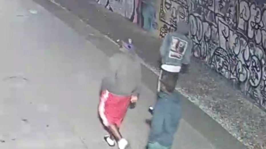 A still from surveillance video the Atlanta Police Department released showing what investigators are calling persons of interest in a murder along the Atlanta BeltLine on Feb. 26, 2022.