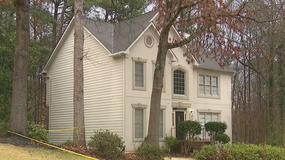 Police investigate after a man was shot and run over in a Cobb County neighborhood on March 7, 2022.