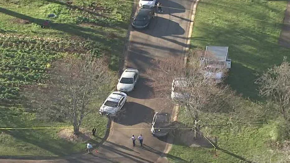 Police investigate a teen's death during a double shooting at a LaGrange park on March 10, 2022.