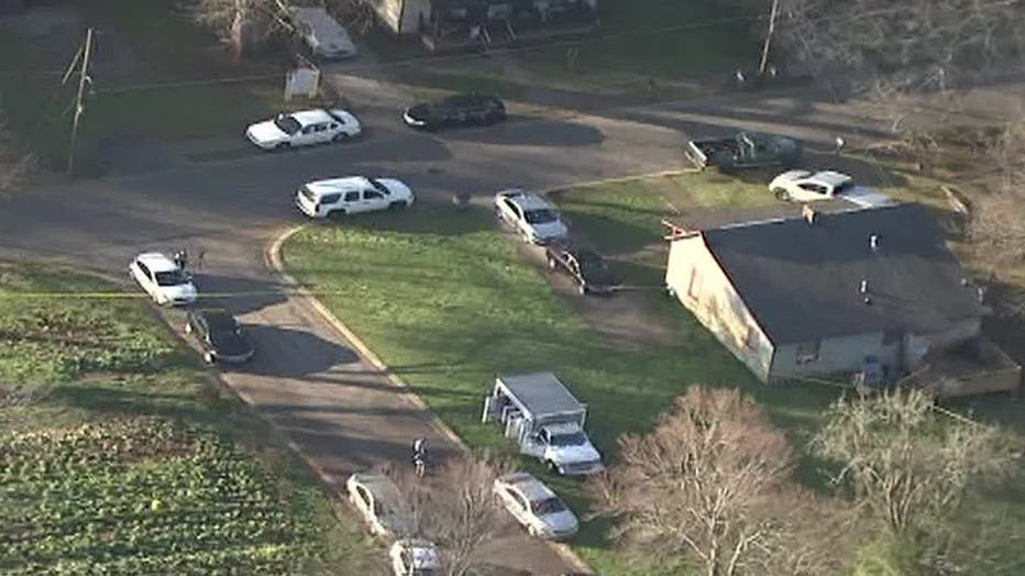 Police investigate a teen's death during a double shooting at a LaGrange park on March 10, 2022.