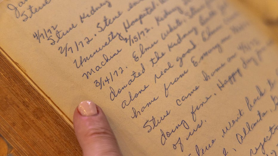 Inside the cover of an old Bible, a woman's carefully scripted handwriting documents her son's transplant surgery.