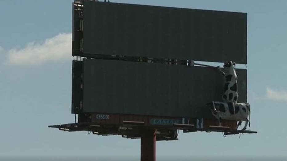 On Monday, the billboard was covered in black paint to cover up the disparaging comment ( FOX 5).