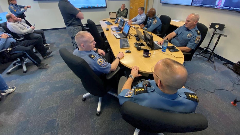 Gwinnett County police meet before a weekend operation targeting street racing on March 18, 2022.