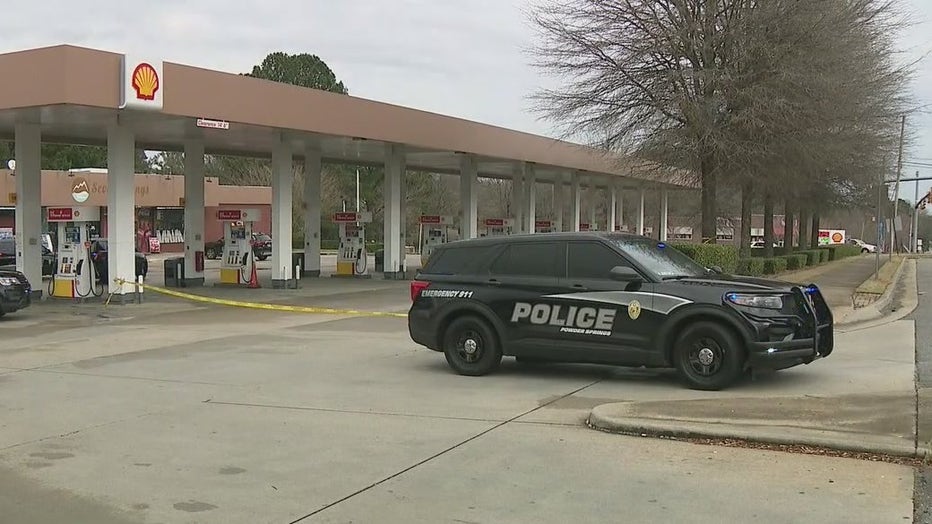 Police investigate a shooting at a Shell gas station on Richard D Sailors Parkway in Powder Springs.