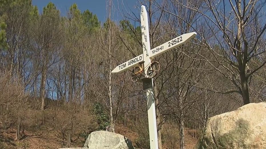 A makeshift memorial was set up along the Atlanta BeltLine where Thomas Arnold was found dead on Feb. 26, 2022.