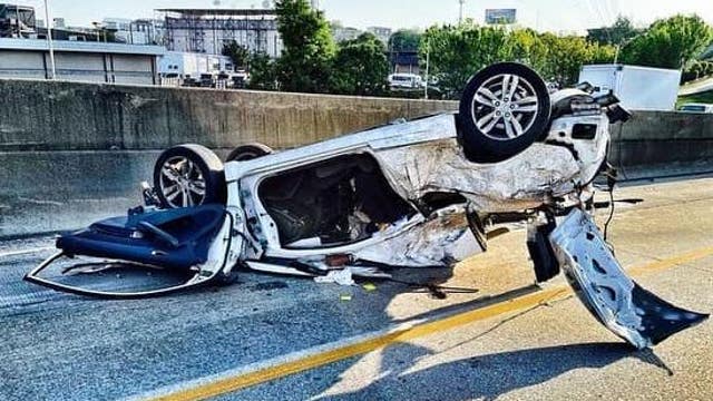 MARTA Police officer steps in to help after vehicle rolls over on I-20