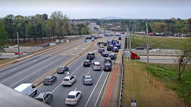 Man shot and killed by police on bridge over I-75 suspected of assaulting officer near Cumberland Mall