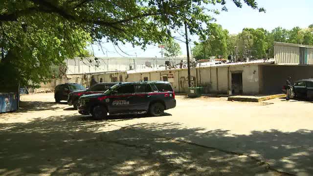 Police activity where security guard was shot point-blank in the back