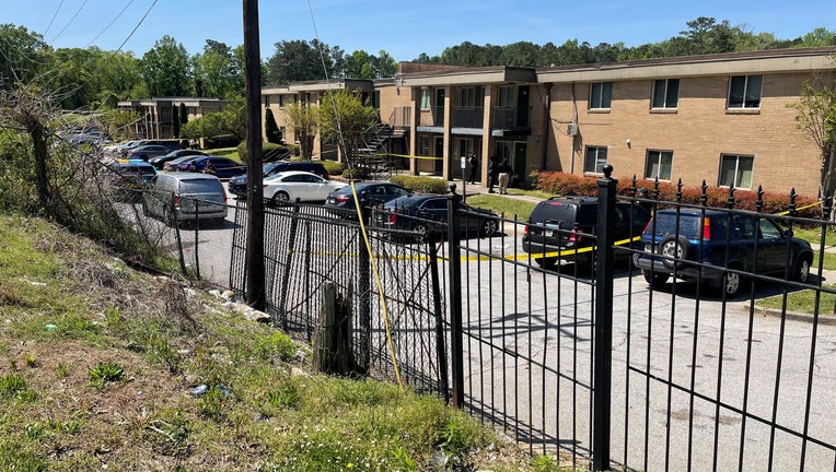 Police investigate a deadly shooting at an apartment complex on Martin Luther King Jr. Drive in Southwest Atlanta on April 20, 2022.