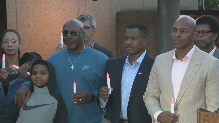 The 100 Black Men of Atlanta hold a candlelight vigil for shooting victims at the King Center on April 20, 2022.