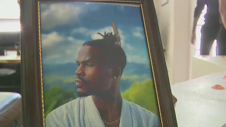A painting of Eligio Bishop adorns a shelf inside his rented home in Decatur. DeKalb County police raid that home and arrested Bishop on April 13, 2022.