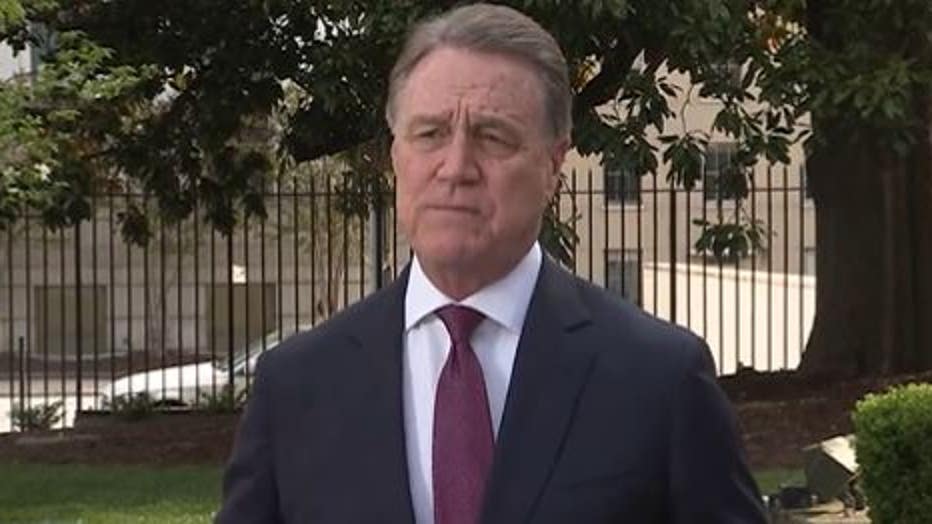 David Perdue speaks to reporters in Atlanta Tuesday, April 12, 2022 (FOX 5 Atlanta).