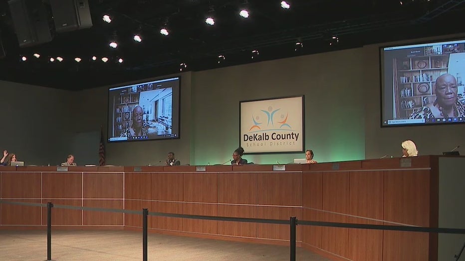 Chants from students and parents from Druid Hills High could be heard during a DeKalb County School Board meeting on April 18, 2022.