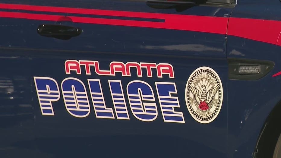 The Atlanta Police Department logo on the site of a patrol car.