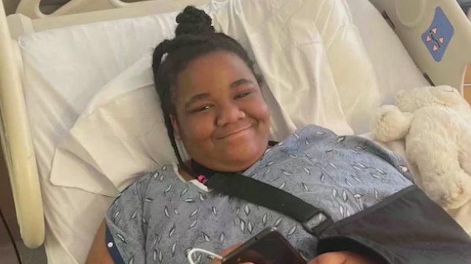 Dareanna Holmes recovering in the hospital after being injured in a drive-by shooting.