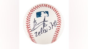 Baseball autographed by Zelenskyy to be sold at auction, proceeds go to Ukraine