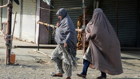 Afghanistan's Taliban order women to cover up head to toe