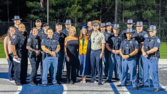 Officers attend graduation for daughter of Cobb County cops, who died from COVID complications