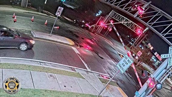 Car crushed by train on Duluth tracks, driver narrowly escapes