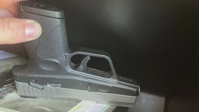 Woman surprised after finding gun in rental car's glove compartment