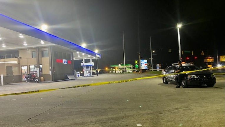 DeKalb County police investigate a deadly shooting at a gas station on May 31, 2022.