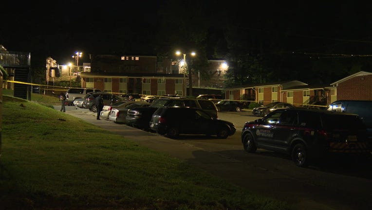 Atlanta police investigate an early morning shooting at an apartment off Hollywood Road NW on May 14, 2022.