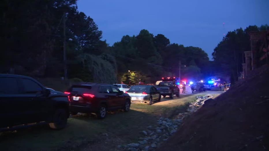 Gwinnett County police investigate a double homicide following a violent domestic dispute in a Lawrenceville-area subdivision on May 5, 2022.