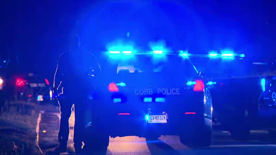 Cobb County police block Hicks Road after a report of an officer-involved shooting on May 19, 2022.