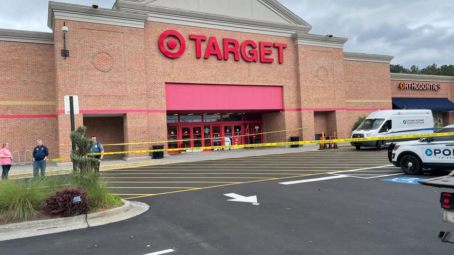 Police investigate a shooting at a Target on Lawrenceville-Suwanee Road in Gwinnett County on May 7, 2022.