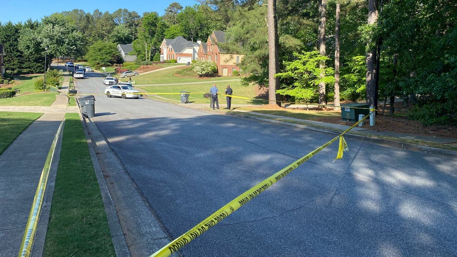 The report came to police at around 7:30 a.m. on Monday morning. Police had taped off a section of Highland Gate Drive in the Highlands at Bridgegate subdivision off of Johnson Road in Gwinnett County. The neighborhood is across from Settles Bridge Park.