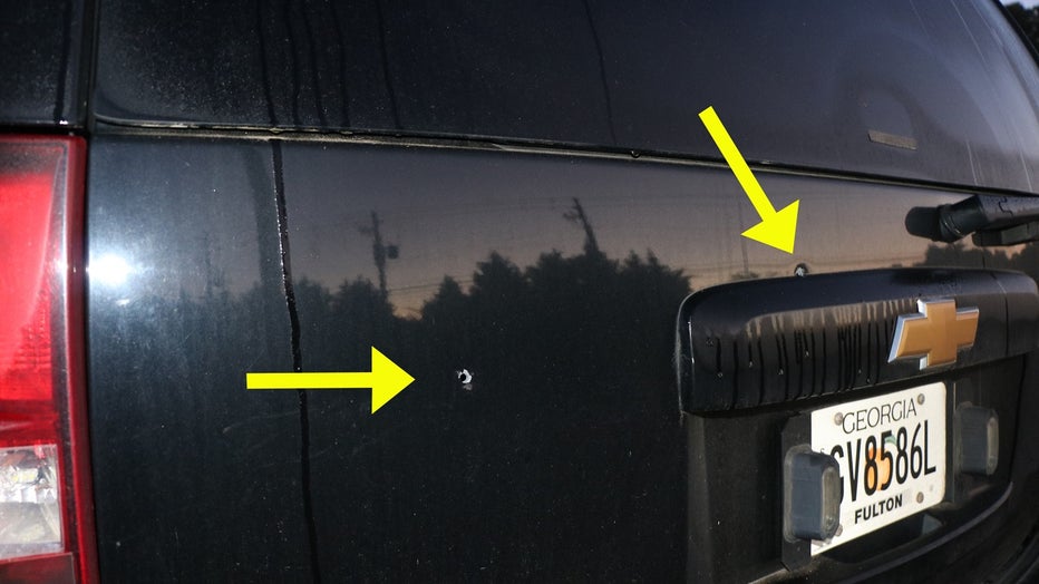 This photo shows bullet holes in the back of a DCS vehicle shot up on May 12, 2022.