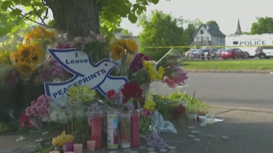 A makeshift memorial grows after a deadly mass shooting at a grocery store in Buffalo, New York on May 14, 2022.