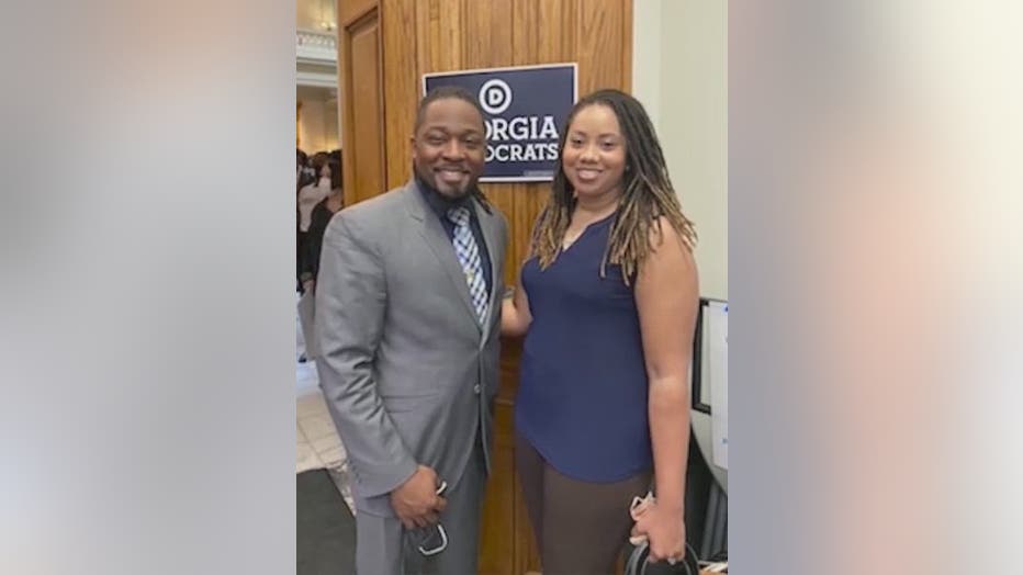 Demoine and Merita Kinney pose for a photo at a Democratic Party of Georgia event.