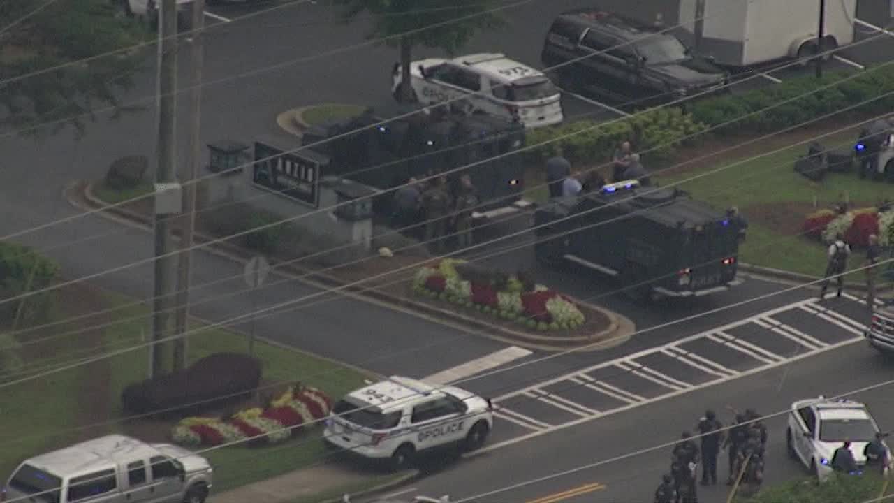 Man in stolen SUV arrested after chase, shootout, SWAT standoff in ...