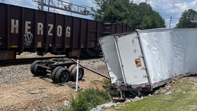 Train slams into tractor-trailer at Suwanee crossing