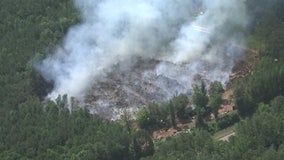 Firefighters 'contain' Douglas County wood fire, smoke remain heavy day after it began