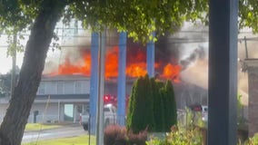 Firefighters battle massive blaze at motel near Tanger Outlets in Commerce