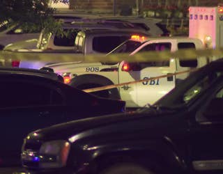 Investigators comb over the parking lot of the Holly Springs Walmart for evidence after a deadly agent-involved shooting on June 13, 2022.