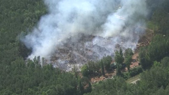 Firefighters 'contain' Douglas County wood fire, smoke remain heavy day after it began