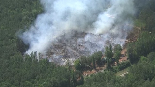 Firefighters 'contain' Douglas County wood fire, smoke remain heavy day after it began
