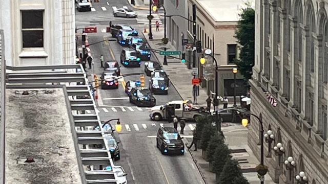 Law enforcement search for armed suspect who fled Downtown Atlanta traffic stop, crashed into pole