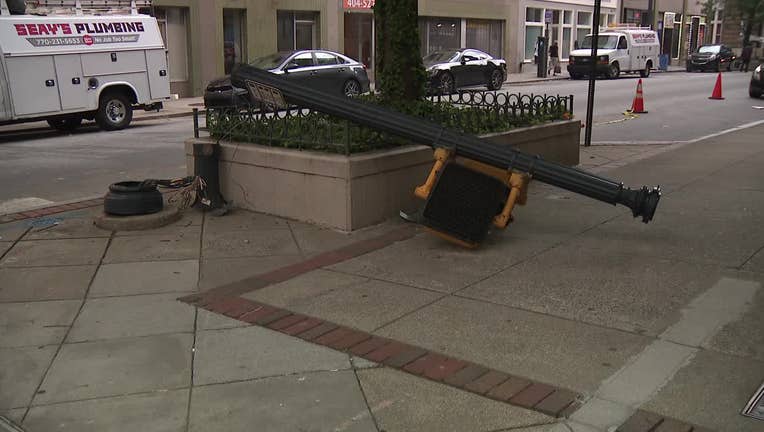 An armed suspect crashed into a pole near a federal building in Downtown Atlanta.