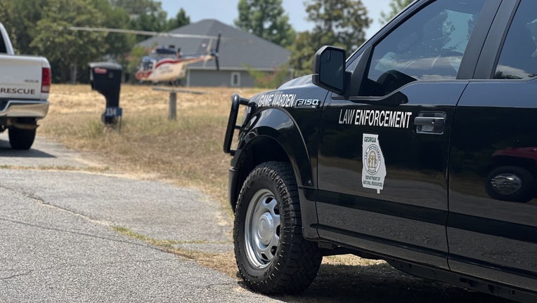 Deputies came to the rescue of a man and woman injured when jet skis collided on Lake Blackshear on Friday, the Crisp County Sheriff's Office said.