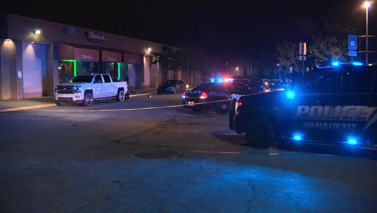 Police investigate what led to four people shot at The Gallery at South DeKalb Mall on Friday night.