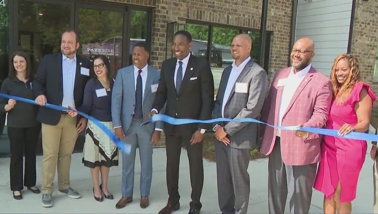 Atlanta Mayor Andre Dickens and other dignitaries cut the ribbon on a new affordable house complex along the Atlanta BeltLine on June 1, 2022.
