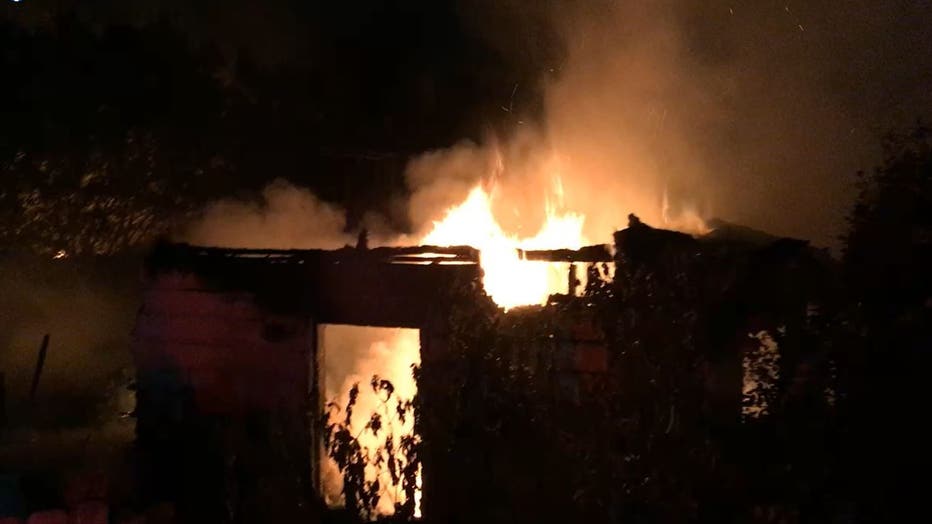 South Fulton firefighters battle two fire at abandoned buildings along Mason Road on June 30, 2022.